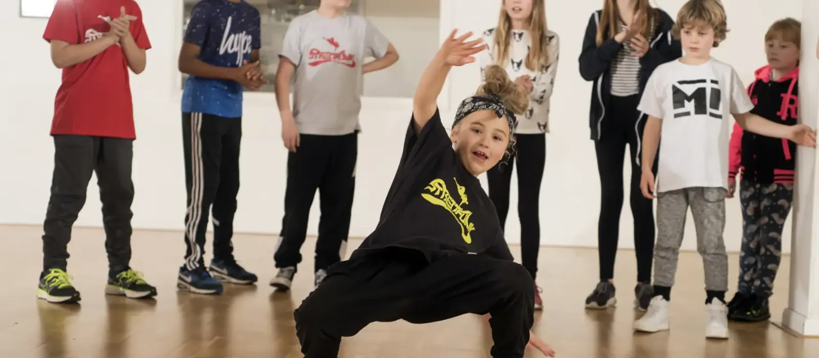 A young b-boy breaking in the studio