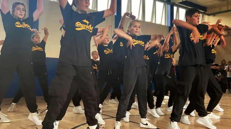 Advanced crew performing on stage