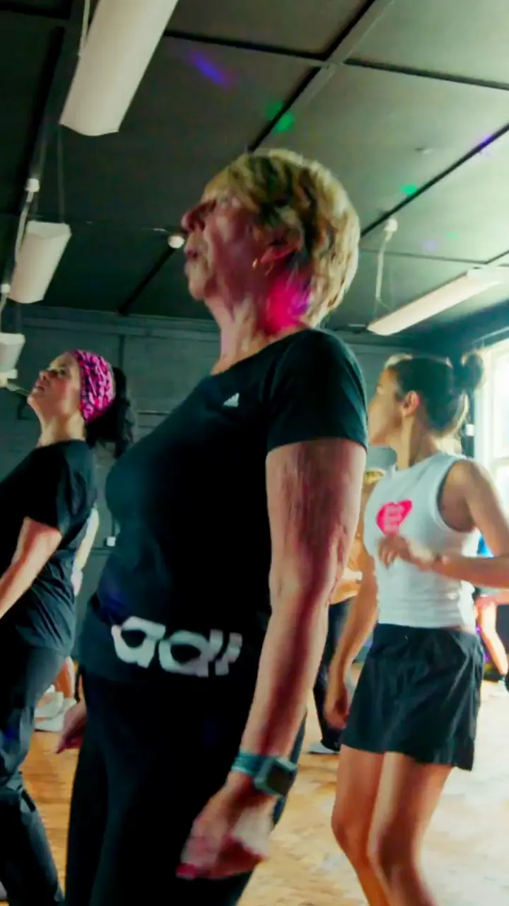 Adults dancing at a FunkFit class